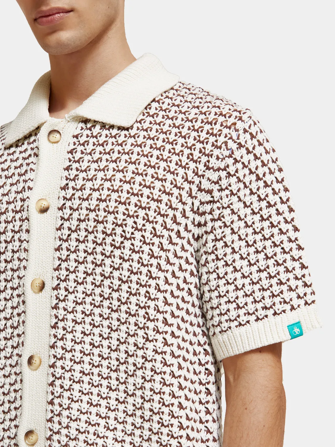 Button-down knitted polo