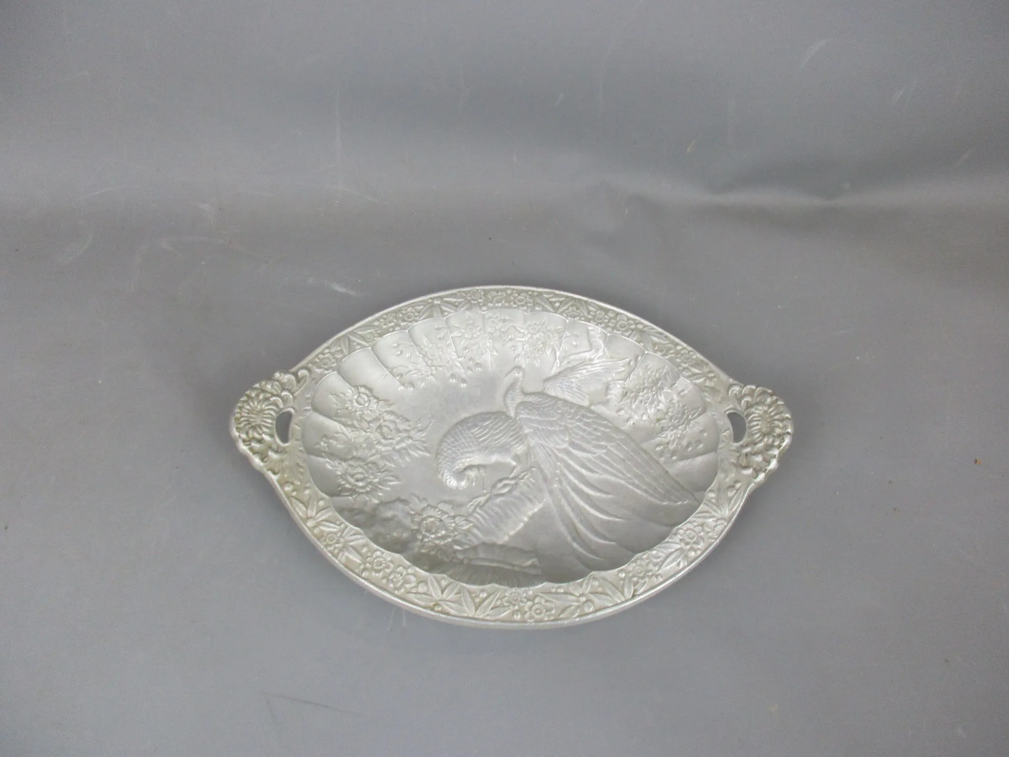 Fuse Sand Cast Aluminium Engraved Peacock Plate Antique c1913 Art Deco